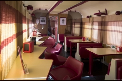 Interior del coche mixto cafetería/segunda del tren Estrella Alcazaba